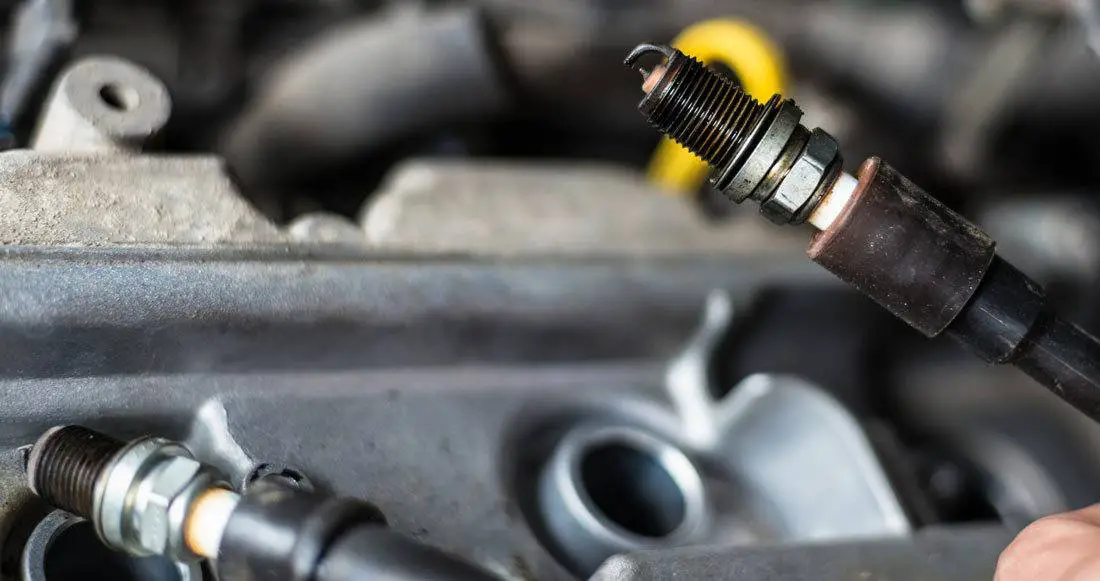 What are the symptoms of a bad spark plug?